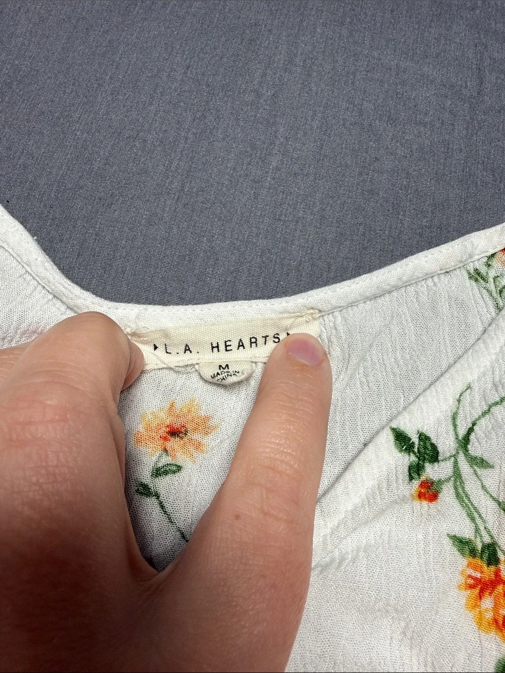 La Hearts White Floral Tie-Front Peplum Blouse with Orange Accents